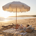 The Holiday Beach Umbrella - Antique White — hero shot
