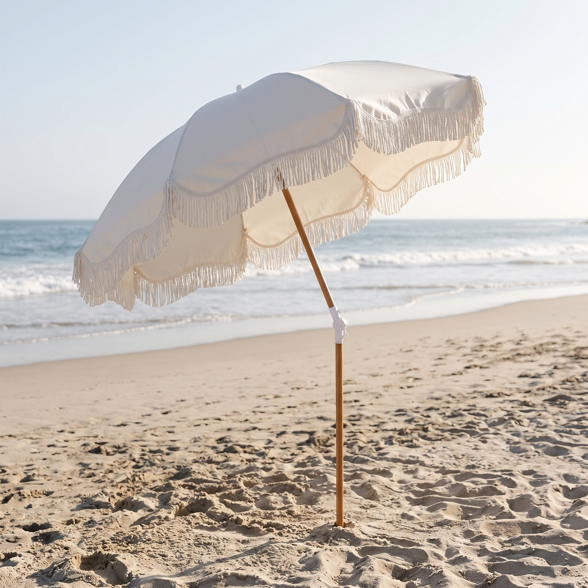 The Holiday Beach Umbrella - Antique White — angle shot